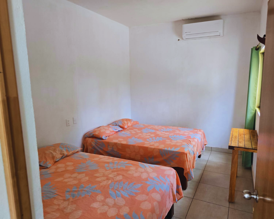 Segunda habitación equipada para el descanso de huéspedes en Bungalow 2