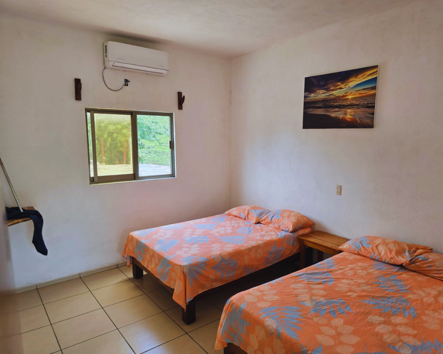 Segunda recámara acondicionada para el confort de los huéspedes en Bungalow 3