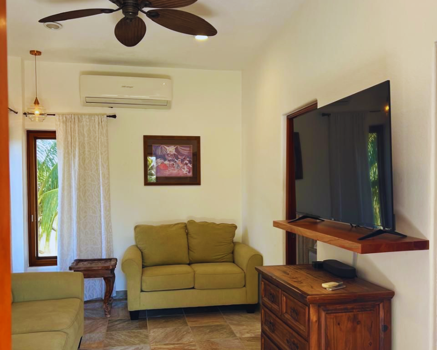 Segunda habitación con cama Queen Size y aire acondicionado en Costalegre